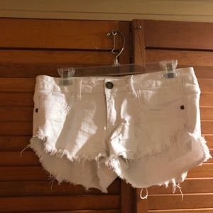 White cutoff shorts